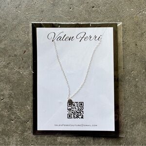 Silver heart shaped necklace